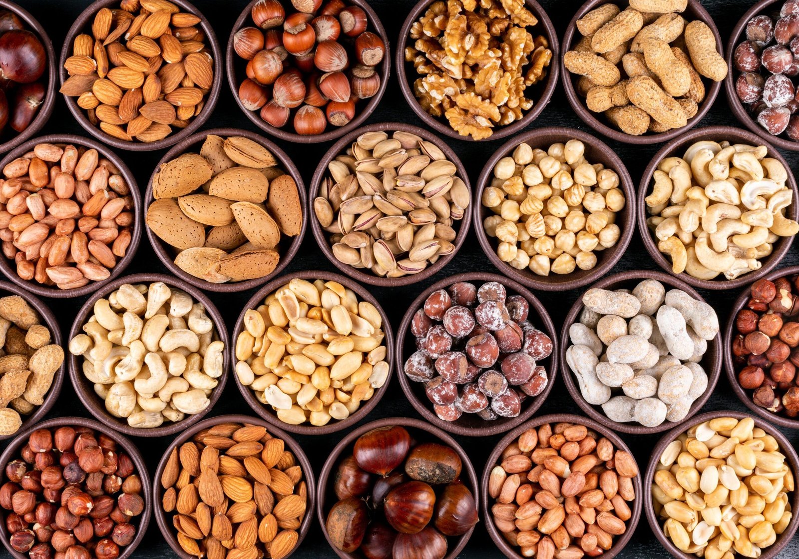 set-pecan-pistachios-almond-peanut-cashew-pine-nuts-lined-up-assorted-nuts-dried-fruits-mini-different-bowls-scaled